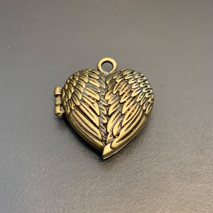 Antique Gold Heart Wings Locket with Metal Micro Dice Set